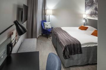 Фото номера Улучшенный номер с кроватью размера «king-size» Отель Scandic Rovaniemi City г. Рованиеми 3