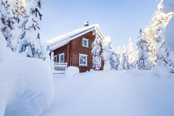 Фото номера Коттедж с 2 спальнями и сауной Дома для отпуска Ounasvaaran Lakituvat Chalets г. Рованиеми 67