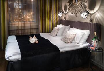 Фото номера Роскошный двухместный номер с 1 кроватью Отель Arctic City Hotel г. Рованиеми 7