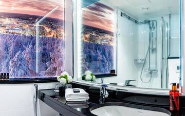 Фото номера Двухместный номер с 2 отдельными кроватями Отель Arctic City Hotel г. Рованиеми 4