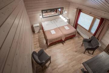Фото номера Стандартное шале (для 4 человек) с сауной Отель Lapland Hotels Ounasvaara Chalets г. Рованиеми 6