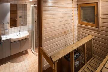 Фото номера Стандартное шале (для 4 человек) с сауной Отель Lapland Hotels Ounasvaara Chalets г. Рованиеми 9