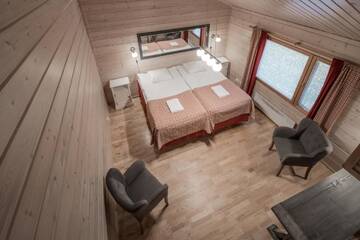 Фото номера Стандартное шале (для 4 человек) с сауной Отель Lapland Hotels Ounasvaara Chalets г. Рованиеми 4