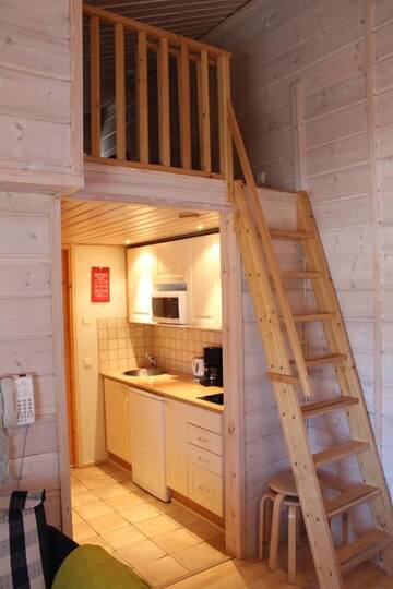 Фото номера Стандартное шале (для 4 человек) с сауной Отель Lapland Hotels Ounasvaara Chalets г. Рованиеми 5