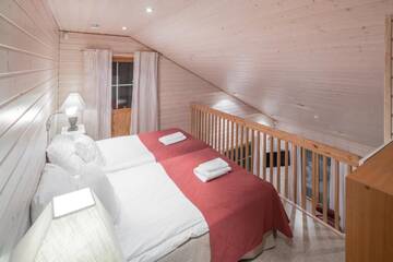 Фото номера Шале Делюкс с сауной Отель Lapland Hotels Ounasvaara Chalets г. Рованиеми 5