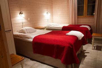 Фото номера Шале Делюкс с сауной Отель Lapland Hotels Ounasvaara Chalets г. Рованиеми 4