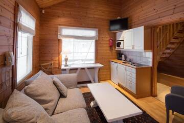 Фото номера Улучшенное шале (для 5 человек) с сауной Отель Lapland Hotels Ounasvaara Chalets г. Рованиеми 2